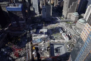 Rebuilding the Site\r - Ground Zero is seen from the north side of the site.\r(Photo: AP Photo/Seth Wenig)