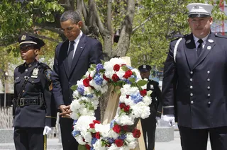 /content/dam/betcom/images/2011/05/Politics/050511_politics_Obama_wreath.jpg