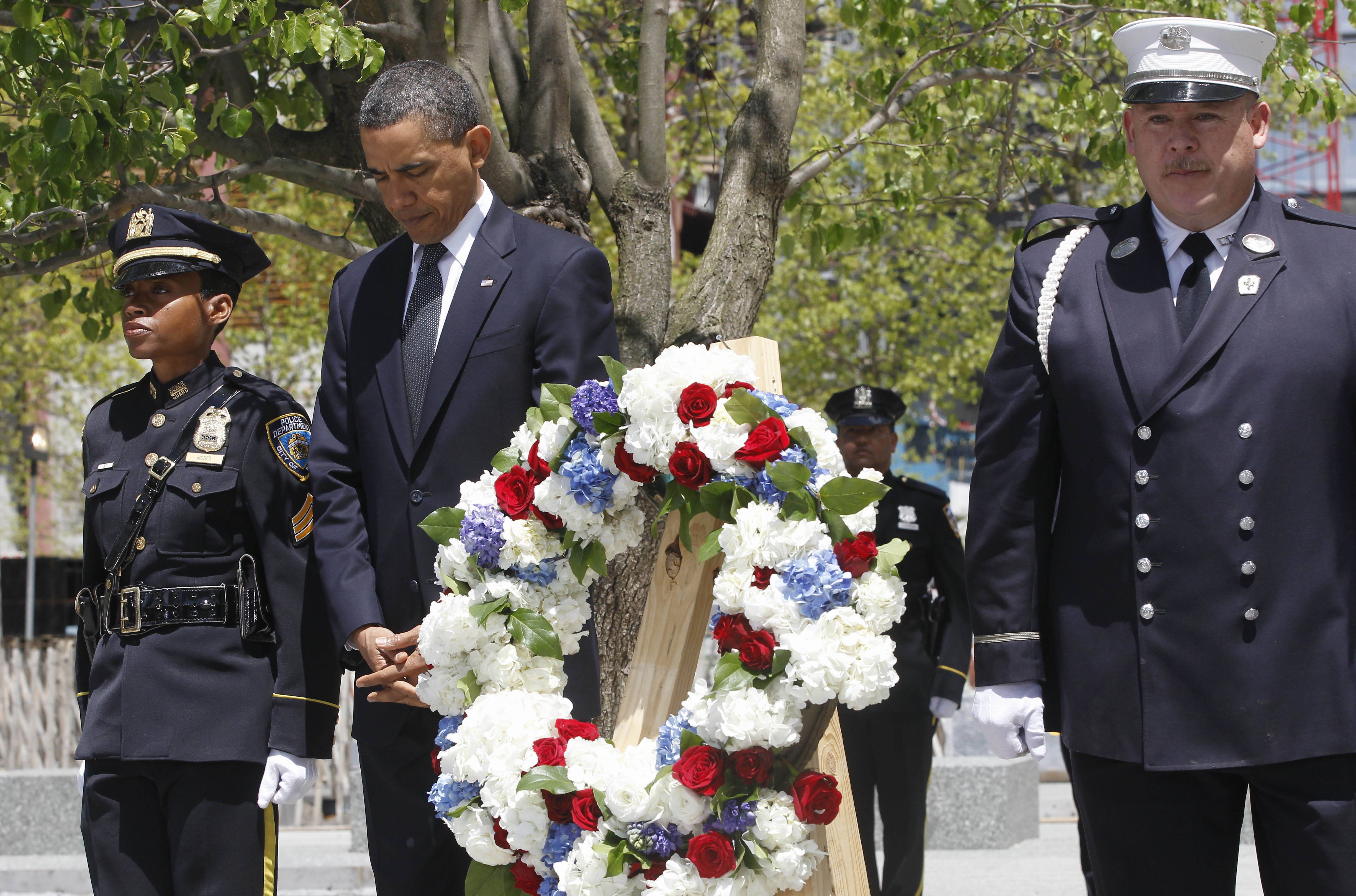 A Moment of Silence - President Barack Obama laid a wreath at Ground Zero Thursday, paying tribute to victims of the Sept. 11, 2001, terrorist attack in New York. During his trip to New&nbsp; York, the commander in chief also met with families of 9/11 victims and first responders. &nbsp;(Photo: AP Photo/Charles Dharapak)