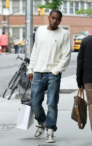 One Mic - Nas takes adavantage of a little alone time to do some shopping at NYC’s Odin.(Photo: Fame Pictures, Inc)
