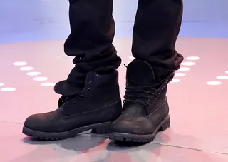 Blackout - Bow Wow relaxes in these black on black tims while on the set of 106.&nbsp;(Photo:&nbsp; Rob Kim/BET/Getty Images for BET)