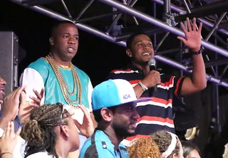 Hi! - Yo Gotti (L) and Pooch Hall stand with the fans moments before they hit up the 106 stage.&nbsp;  (Photo:&nbsp; Rob Kim/BET/Getty Images for BET)