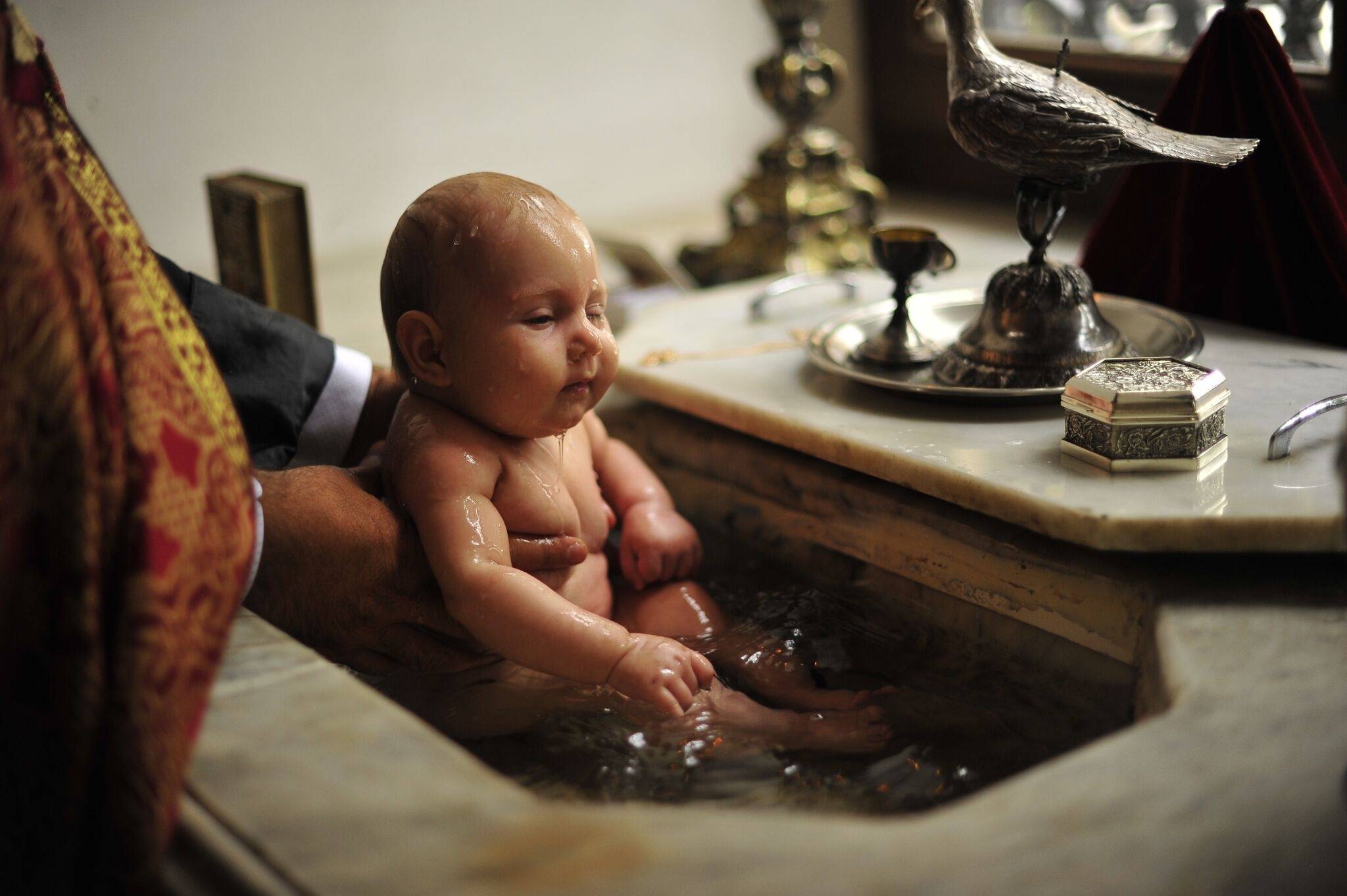 What In The Baptism Is Going On In This Video Of A Baby Being