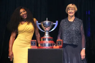 Bossin' It Up - Serena Williams looked every bit the sports icon she is standing alongside former tennis player Margaret Court with the Hopman Cup at the 2016 Hopman Player Party in Australia.(Photo: Philip Gostelow/Getty Images)