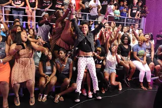 Raise Your Hands - Clinton Sparks greets fans at 106. (Photo: John Ricard/BET/Getty Images for BET)