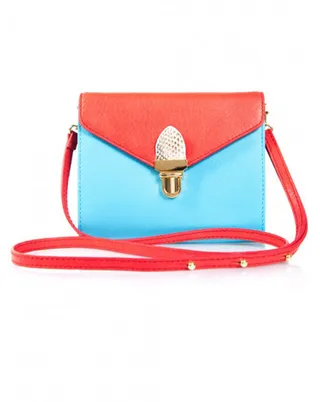 Cartable Red and Aqua Mini - Add a fun pop of color to your favorite outfits with Cartable's two-tone chic mini handbag. The shape is ultra-feminine!   (Photo: Shop Les Nouvelles)&nbsp;