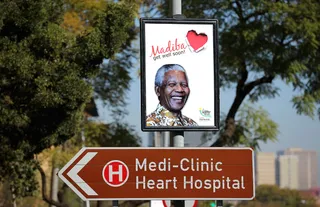 /content/dam/betcom/images/2013/07/Global/071713-global-mandela-nelson-get-well-card-sign.jpg