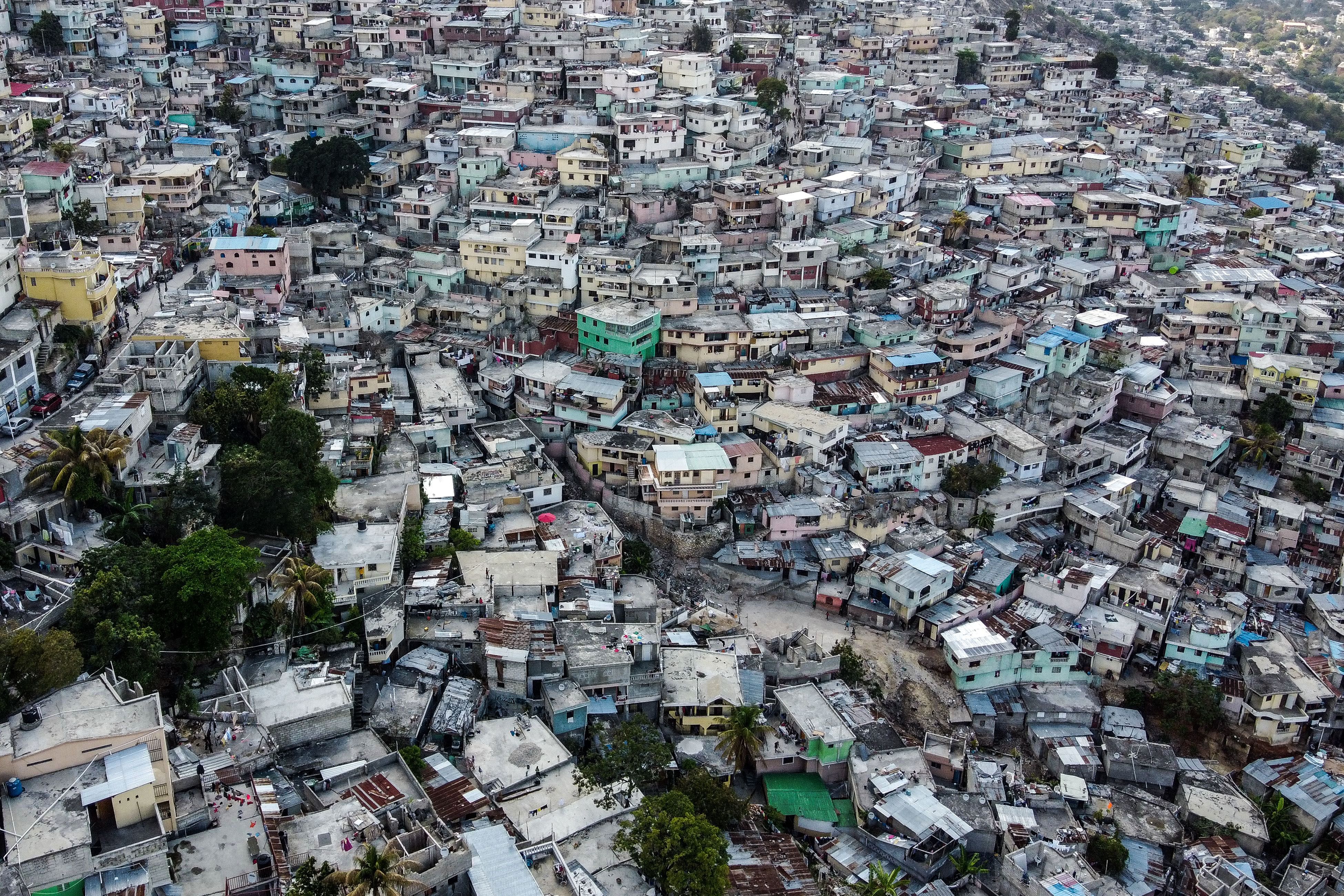 TOPSHOT - Aerial view of the high density of houses in the neighbourhood of Jalousie in Port-au-Prince, on March 12, 2020. (Photo by CHANDAN KHANNA / AFP) (Photo by CHANDAN KHANNA/AFP via Getty Images)