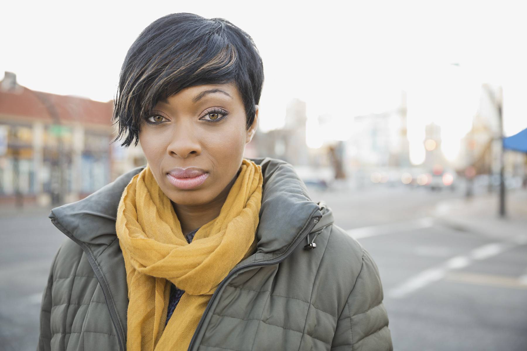 Portrait of confident woman on city street