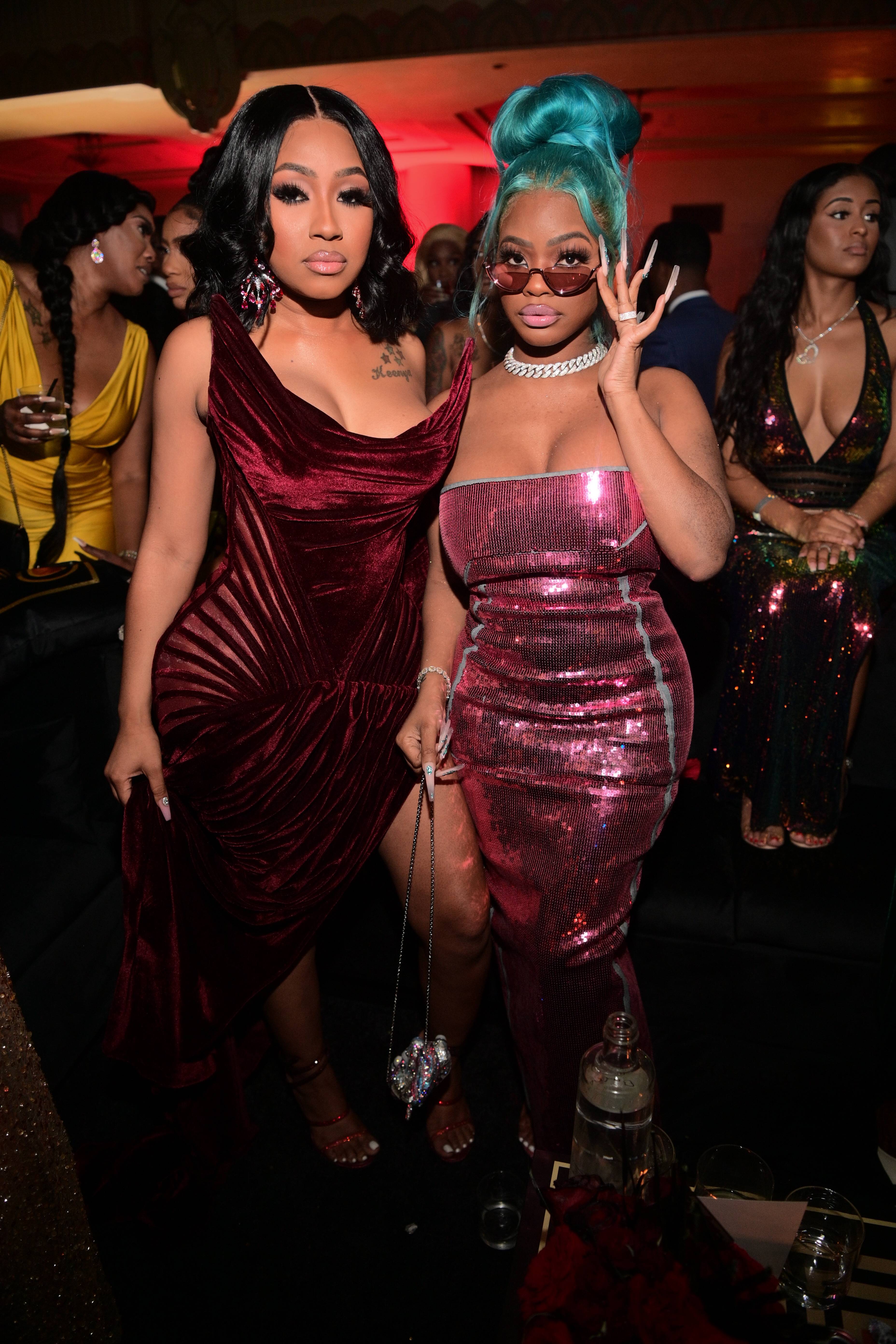 yung miami burgundy dress City Girls' Best Style Moments: From Chic Streetwear To Glamorous Gowns |  News
