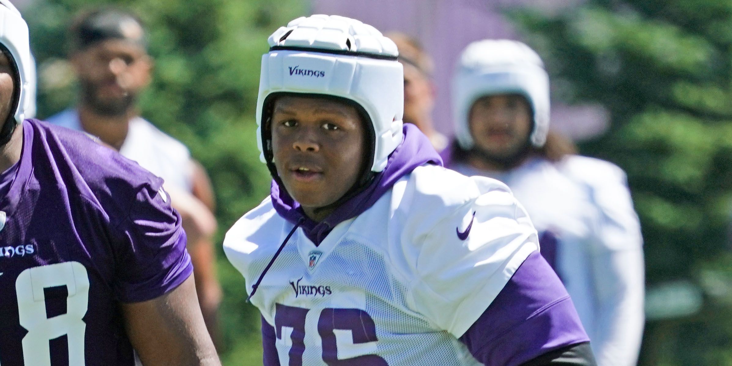EAGAN, MN - JUNE 16: Minnesota Vikings guard Kyle Hinton (68) and Minnesota Vikings defensive tackle Jaylen Twyman (76) follow the play during Vikings Minicamp on June 16, 2021 at Twin Cities Orthopedics Performance Center in Eagan, Minnesota. (Photo by Nick Wosika/Icon Sportswire via Getty Images)
