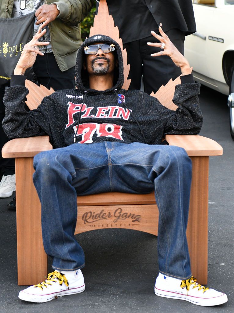WEST HOLLYWOOD, CALIFORNIA - FEBRUARY 28: Snoop Dogg poses for portrait during classic car meet at Mel's Drive-In on February 28, 2021 in West Hollywood, California. (Photo by Rodin Eckenroth/Getty Images)