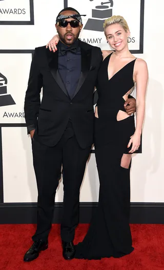 Mike Will Made It and Miley Cyrus - The mega producer and his pop star muse make a coordinated appearance in head-to-toe black.(Photo: Jason Merritt/Getty Images)