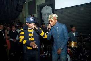 Taking Care of Paperwork - T.I. and&nbsp;Pharrell Williams&nbsp;host a party at the Sayer's Club in Hollywood.  (Photo: Keipher McKennie/WireImage)