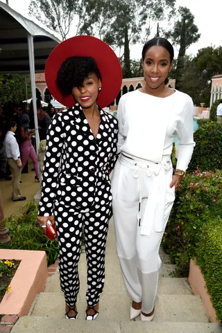 Ladies Who Brunch - Janelle Monáe and Kelly Rowland make a striking pair at a pre-Grammy brunch.  (Photo: Kevin Mazur/Getty Images For Roc Nation)