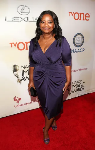 Octavia Spencer - The Oscar winner also chose eggplant for her color choice and shows off her trimmed-down figure in a wrap dress.  (Photo: Jesse Grant/Getty Images for NAACP Image Awards)