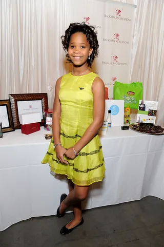 Quvenzhané Wallis - The Annie star looks adorable in an age-appropriate lime green frock.  (Photo: Angela Weiss/WireImage)