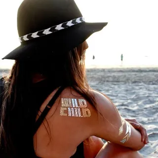 Flash Tattoos Child of Wild ($30) - This bold "Wild Child" pick will bring a glittering touch of free-spirited inspiration to your Bohemian ensemble.  (Photo: Flash Tattoos)