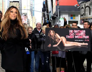 Surprise! - The fabulous Wendy Williams unveils her new nude PETA campaign in Times Square. Who knew that Wendy would "rather go naked than wear fur?"&nbsp;(Photo: Michael Carpenter/ WENN.com)