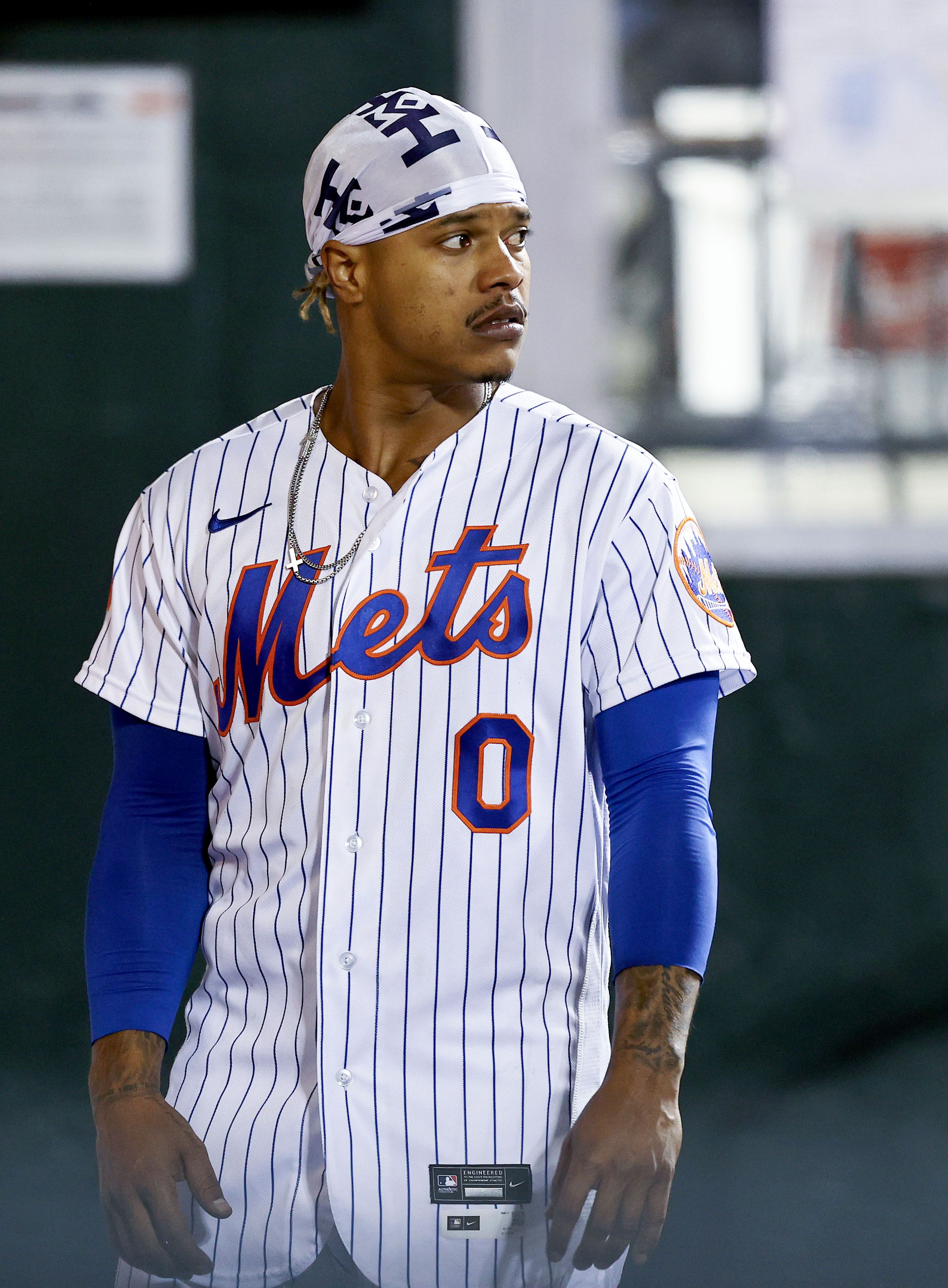 NEW YORK, NEW YORK - MAY 11: Marcus Stroman #0 of the New York Mets reacts in the dugout after a run is scored in the seventh inning against the Baltimore Orioles at Citi Field on May 11, 2021 in the Flushing neighborhood of the Queens borough of New York City.Stroman was pulled from the game right before the run was scored. (Photo by Elsa/Getty Images)