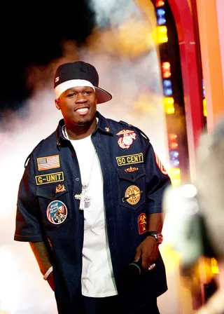 Dress for Success - 50 cashed in at the peak of the hip hop artists branded clothing era with his G-Unit apparel and made a few millions with Reebok too for his signature footwear.(Photo: Evan Agostini/Getty Images)