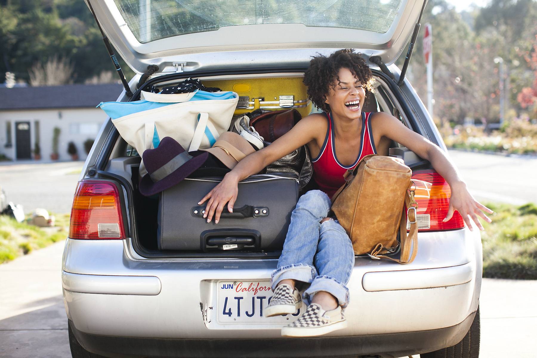 woman packing for a road trip