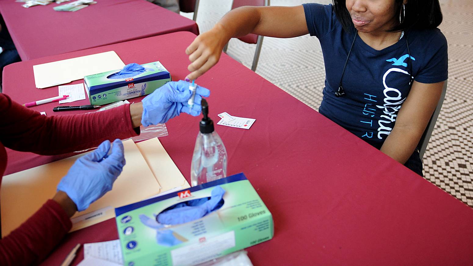 woman getting AIDS test