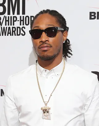 'Trap N****s' - Future falls to his knees here as he asks God to look over him and his fellow drug dealers while they do their dirt to make a better way.(Photo: Neilson Barnard/Getty Images for BMI)