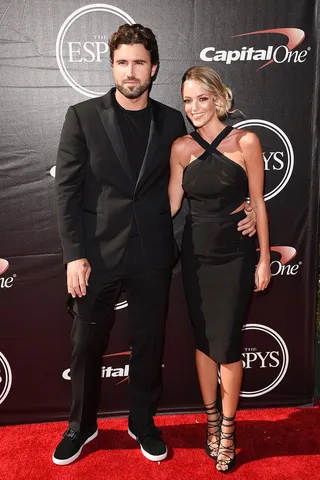 Brody Jenner - The TV personality and his girlfriend donned all black. He wore a black suit and she opted for a dress with a halter-style neckline and strappy shoes.&nbsp;(Photo: Jason Merritt/Getty Images)