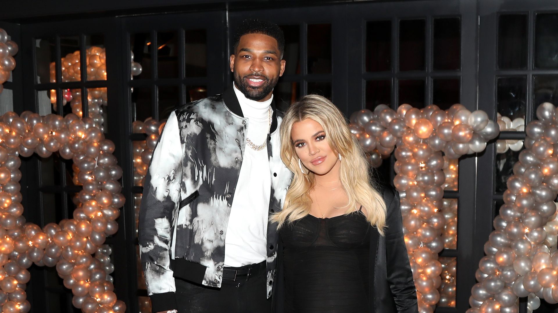 Tristan Thompson and Khloe Kardashian pose for a photo as Remy Martin celebrates Tristan Thompson's Birthday at Beauty & Essex on March 10, 2018 in Los Angeles, California. 