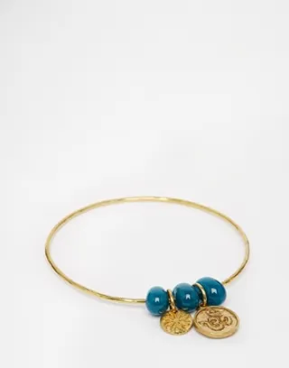Fashion Bangle ($22.74) - Accessories are a quick way to make a basic outfit amazing. These bangles effortlessly spice things up. (Photo: ASOS)
