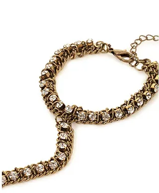 Hand Jewelry ($6.90) - The only thing better than accessories is unique accessories. Draw attention to your manicure with fun hand jewelry. (Photo: Forever 21)