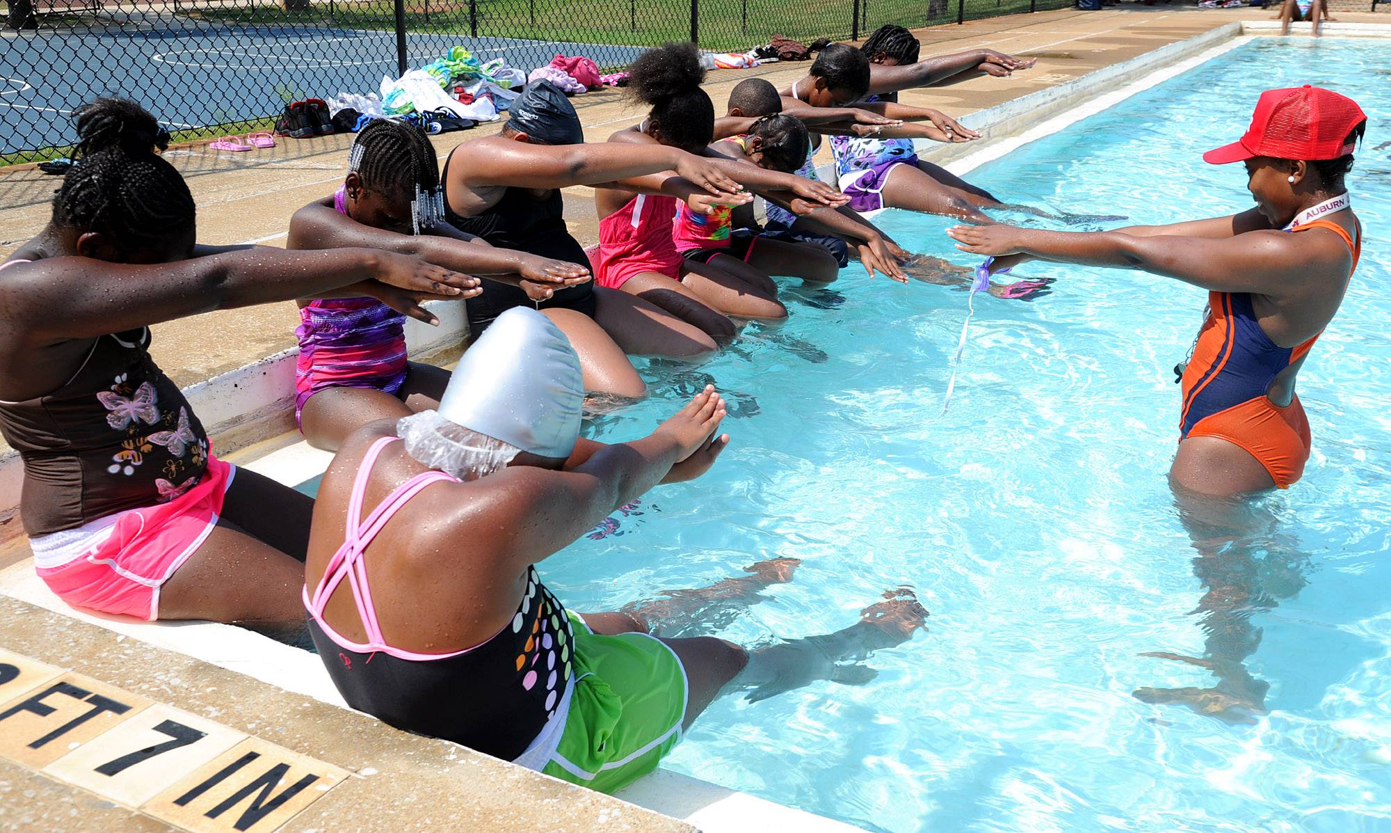 Be a Safe Swimmer - Swim in a supervised, marked area with a lifeguard present, and swim with others. Never swim alone. If you are swimming with children practice “reach supervision” by keeping your arm in arm’s length of the child while they are in or around the pool, lake or ocean, the Red Cross advises.&nbsp;(Photo: Mark Almond/Birmingham News/Landov)