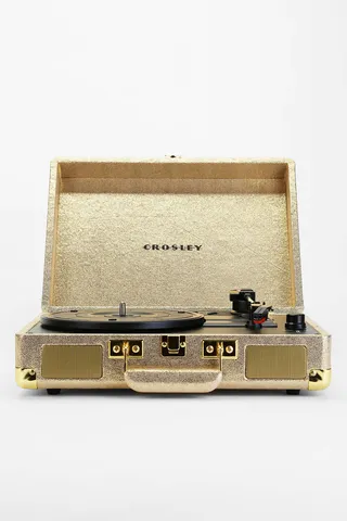 Crosley X UO Cruiser Briefcase Portable Vinyl Record&nbsp;Player ($98) - Any vintage lover can appreciate this gilded turntable. This record player delivers crystal-clear sound while bringing you back to a simpler time. Shop it at Urban Outfitters.  (Photo: Urban Outfitters)