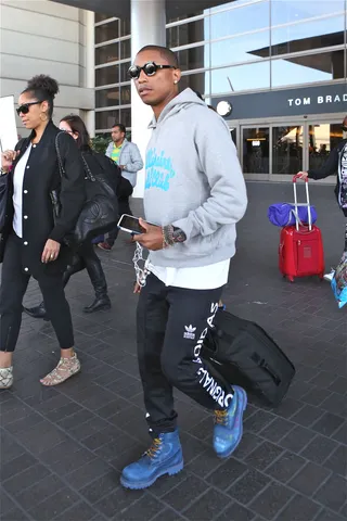 On the Move - Pharrell Williams arrives in Los Angeles just ahead of the American Music Awards.(Photo: Splash News)