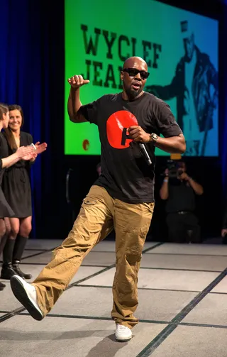 Pump It Up - Wyclef Jean performs at the Play.It Podcast Network launch party presented by CBS Radio and CBS Local Digital Media at Caesars Palace in Las Vegas.(Photo: Eric Jamison/Getty Images for CBS Radio &amp; CBS Local Digital Media)