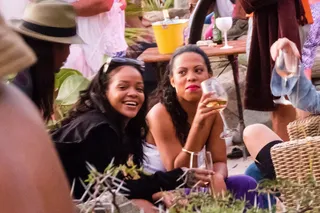 Toast It Up - Rihanna&nbsp;shares cocktails with her girls on Shell Beach at Do Brasil beach bar in St. Barths. (Photo: Splash News)