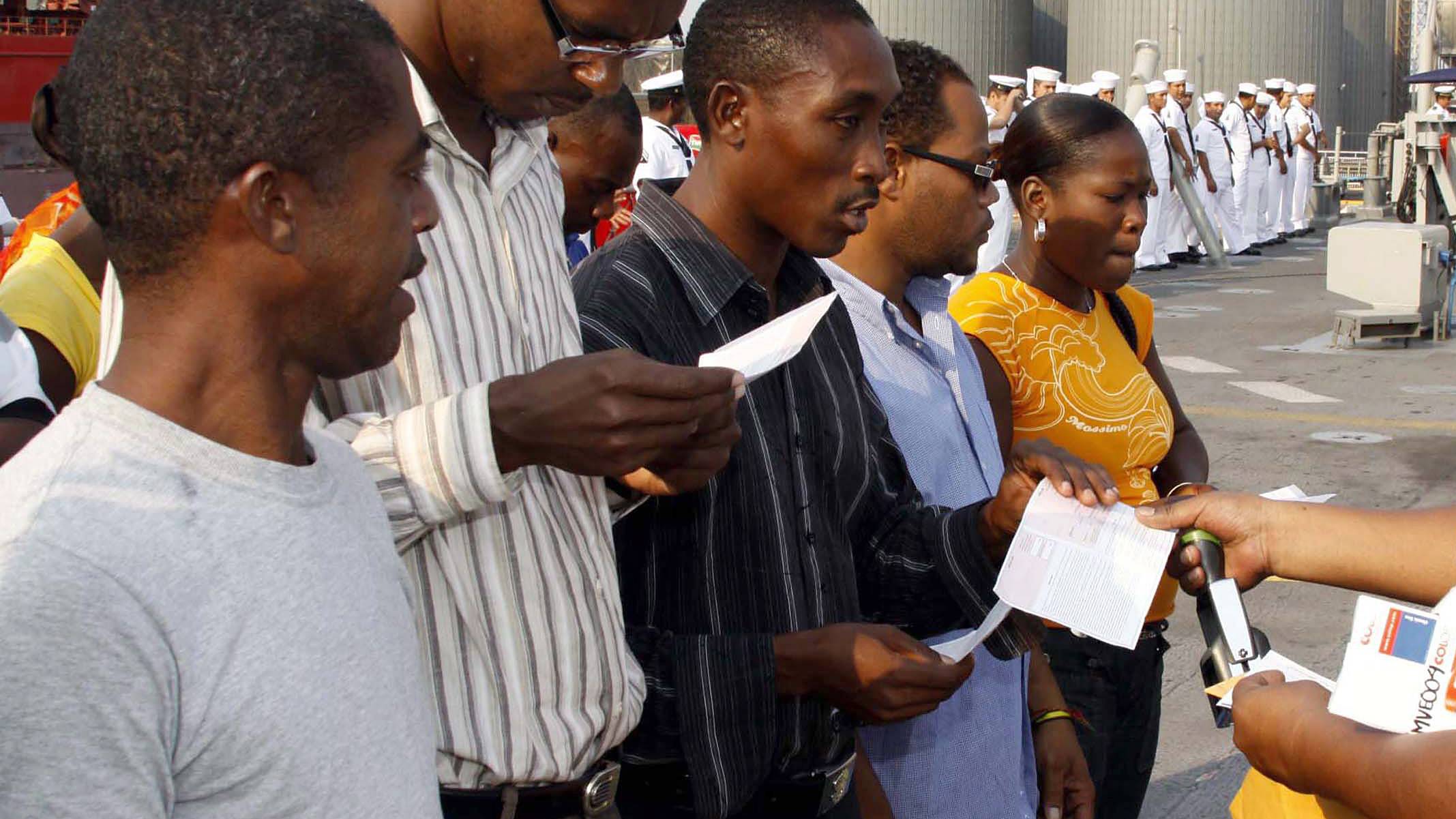 Brazil Grants Haitians Visas, but Border Security to Increase - In efforts to both aid Haitians still seeking stability following the devastating 2010 earthquake and protect its borders from an influx of Haitian immigrants, the Brazilian government announced that it will grant residence visas to 4,000 immigrants currently in the country, while vowing to deport all others that cross its borders illegally.&nbsp;(Photo: EPA/Saul Ramirez/Landov)