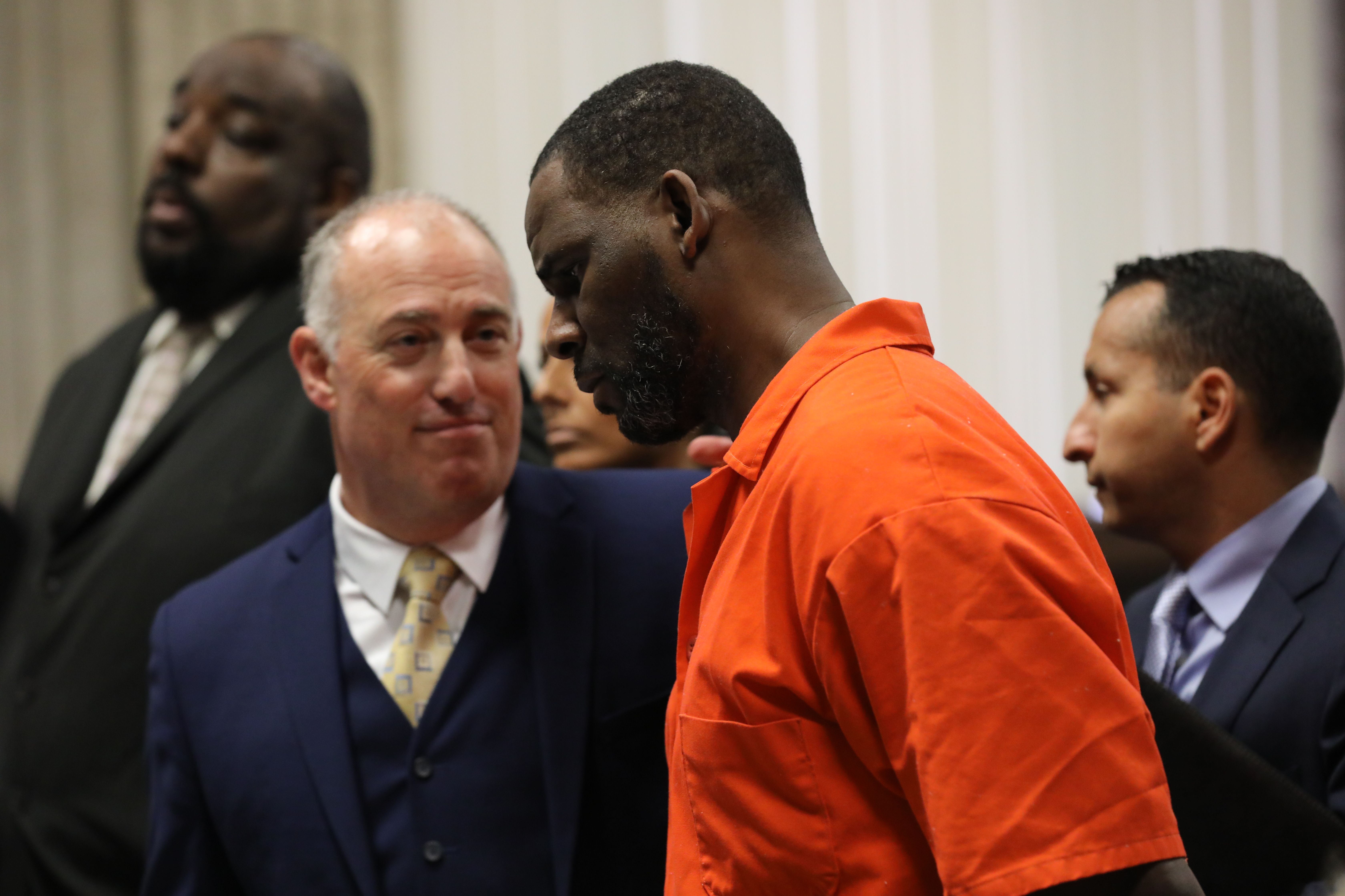 CHICAGO, IL -  SEPTEMBER 17:  Singer R. Kelly appears standing beside his attorney, Steven Greenberg during a hearing at the Leighton Criminal Courthouse on September 17, 2019 in Chicago, Illinois.  Kelly is facing multiple sexual assault charges and is being held without bail.   (Photo by Antonio Perez - Pool via Getty Images)