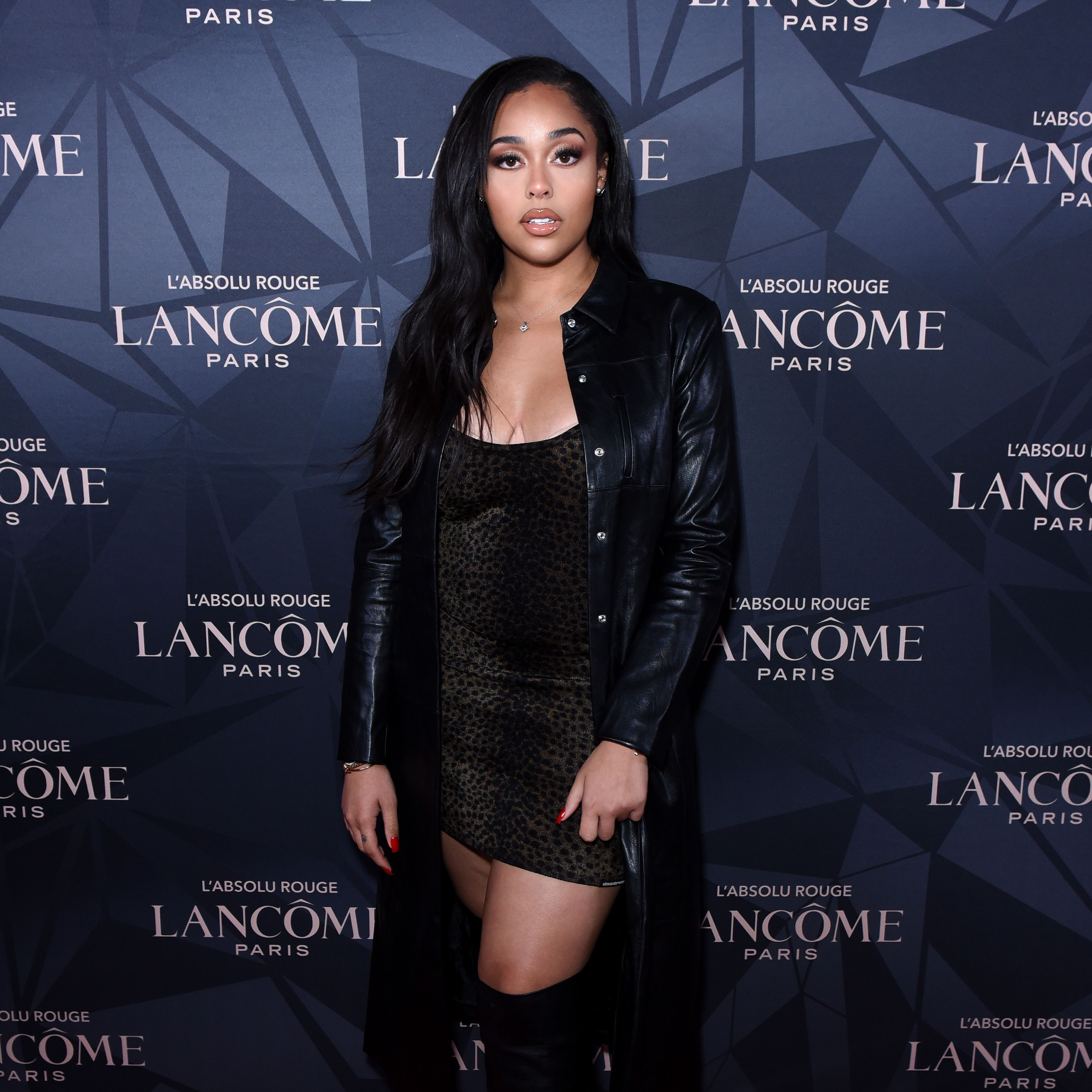 WEST HOLLYWOOD, CALIFORNIA - DECEMBER 05: (EDITORS NOTE: Retransmission with alternate crop.) Jordyn Woods attends LancÃ´me x Vogue L'Absolu Ruby Holiday Event at Raspoutine on December 05, 2019 in West Hollywood, California. (Photo by Presley Ann/Getty Images for LancÃ´me x Vogue)