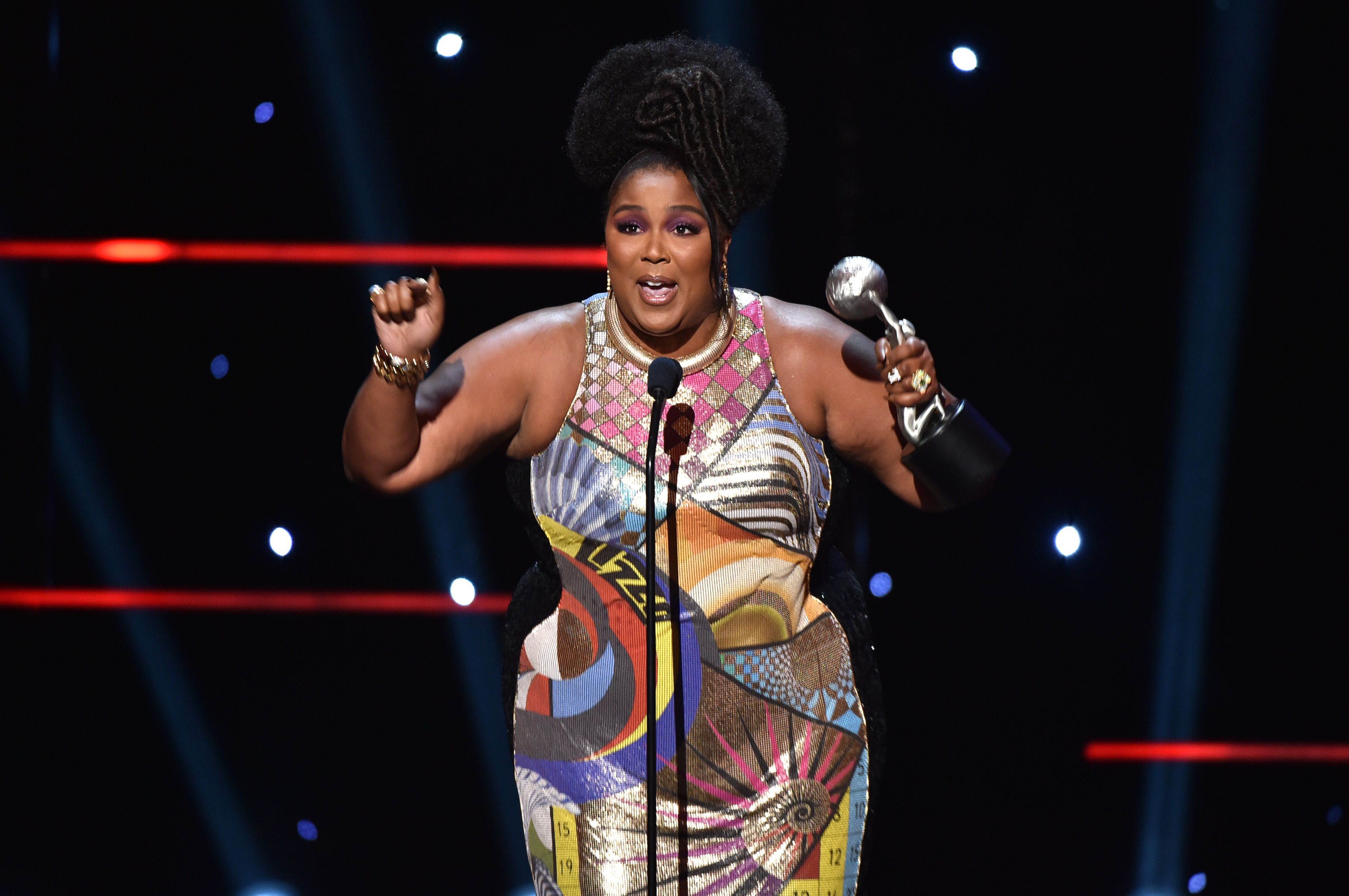 PASADENA, CALIFORNIA - FEBRUARY 22: Lizzo accepts Entertainer of the Year award onstage during the 51st NAACP Image Awards, Presented by BET, at Pasadena Civic Auditorium on February 22, 2020 in Pasadena, California. (Photo by Aaron J. Thornton/Getty Images for BET)