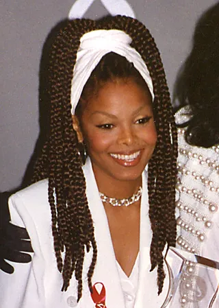 Braided Brilliance - Janet’s bold Poetic Justice braids were an iconic trend that we will always remember her for.(Photo: PA Photos/Landov)