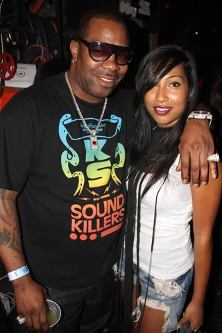 Guest Features - Busta Rhymes and Melanie Fiona kick it backstage. Both artists came out as guests for other aritsts on the bill and both represent their West Indian heritage to the fullest.&nbsp;(Photo: Walik Goshorn/BET Digital)