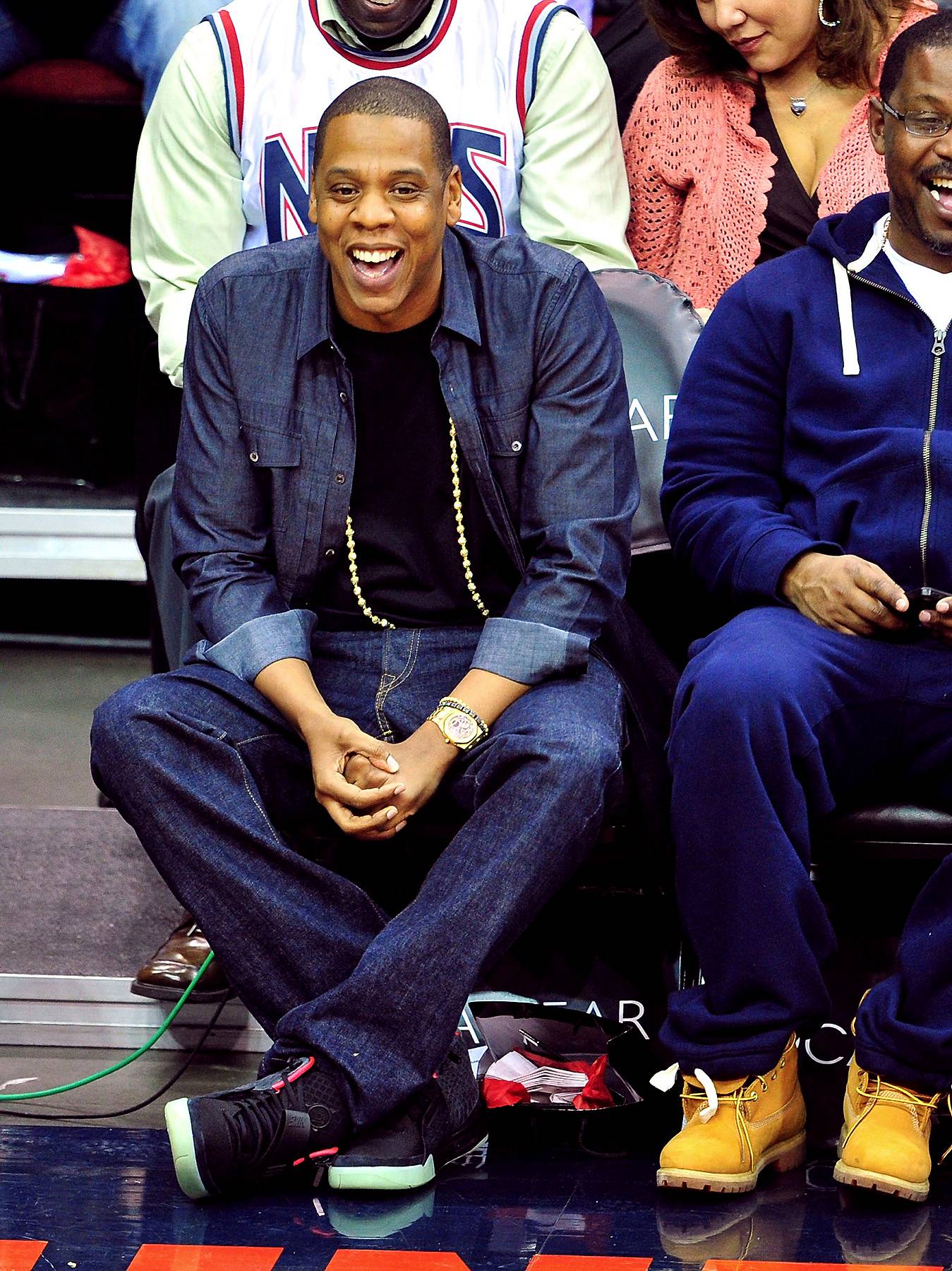 Courtside Cool - Jay-Z enjoys his New Jersey Nets as they play the Atlanta Hawks at the Prudential Center in Newark, New Jersey. Jigga's presence at the game puts the hush on rumors that wifey Beyoncé was heading to the hospital to deliver their baby girl before the New Year. Enjoy the downtime while you can, Jay! (Photo: James Devaney/WireImage)
