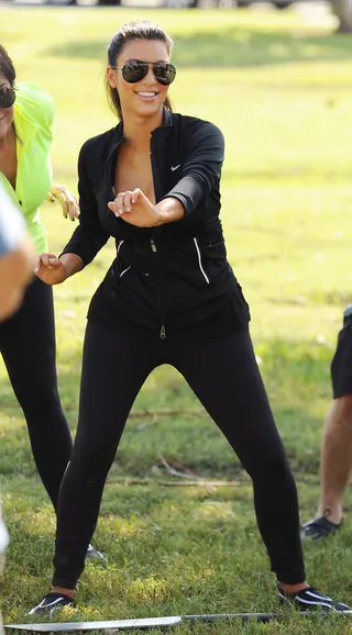 Row, Row Your Boat - Kim Kardashian is photographed practicing for a paddle boat ride with her family in Miami during a location shoot for her reality series Kim and Kourtney Take Miami.&nbsp;&nbsp;(Photo: Manuel Munoz, PacificCoastNews.com)