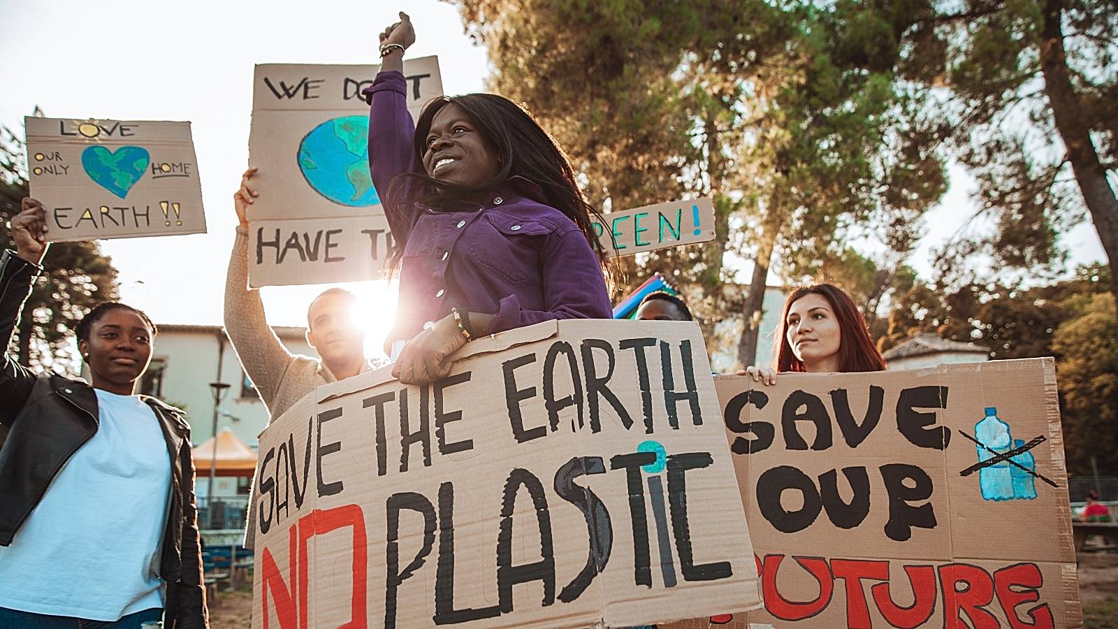 Activists demonstrating against global warming - stock photo
Young group of teenagers activists demonstrating against global warming.