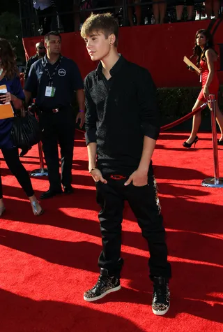 Justin Bieber - Young Justin stepped in cool all black threads with spiked Louboutin sneakers.(Photo: Frederick M. Brown/Getty Images)