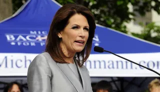 Michele Bachmann - Minnesota Rep. Michele Bachmann, who is poised to win the Ames straw poll in Iowa this weekend, is calling on President Obama to force Treasury Secretary Timothy Geithner to resign, and said during a campaign stop in the state that keeping him is "a tremendous disservice to the American people," ABC News reports. Bachmann also criticized Obama for spending the weekend at Camp David after Standard &amp; Poor’s downgraded the nation’s credit rating.(Photo by Steve Pope/Getty Images)