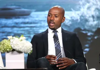 Panel Swag - Romany Malco spoke on stage during the Mad Dogs panel during the 2016 Television Critics Association Winter Tour.(Photo: Frederick M. Brown/Getty Images)