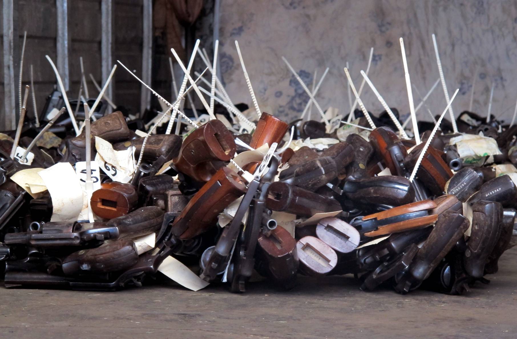 Jamaican Government Destroys 2,000 Guns - Roughly 2,000 firearms were melted down in a blazing furnace Tuesday as part of an effort designed to combat gun trafficking and corruption in Jamaica, while reducing violent crime.(Photo: AP Photo/ David McFadden)